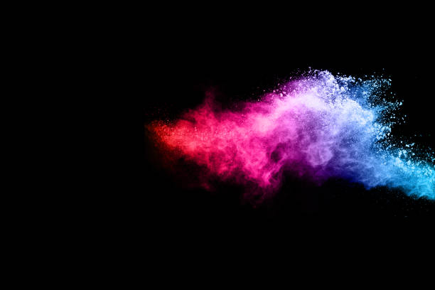 istock abstract colored dust explosion on a black background.abstract powder splatted background,Freeze motion of color powder exploding/throwing color powder, multicolored glitter texture. 1055264042