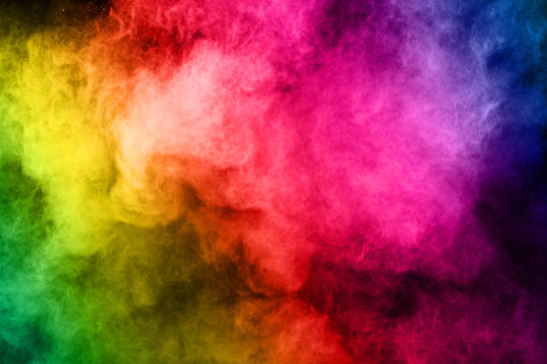 istock abstract colored dust explosion on a black background.abstract powder splatted background,Freeze motion of color powder exploding/throwing color powder, multicolored glitter texture. 1055264186
