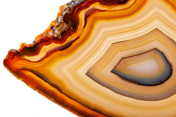 istock Macro mineral stone Yellow, brown Agate breed a white background 1055266570