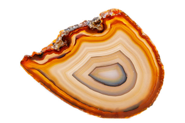 istock Macro mineral stone Yellow, brown Agate breed a white background 1055266628