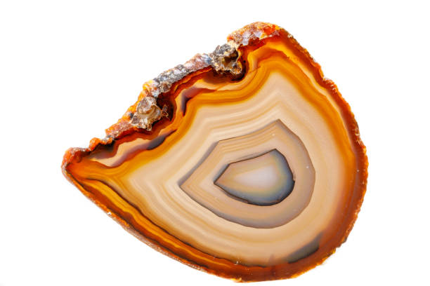 istock Macro mineral stone Yellow, brown Agate breed a white background 1055266654
