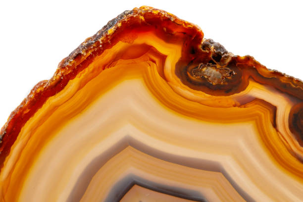 istock Macro mineral stone Yellow, brown Agate breed a white background 1055266694
