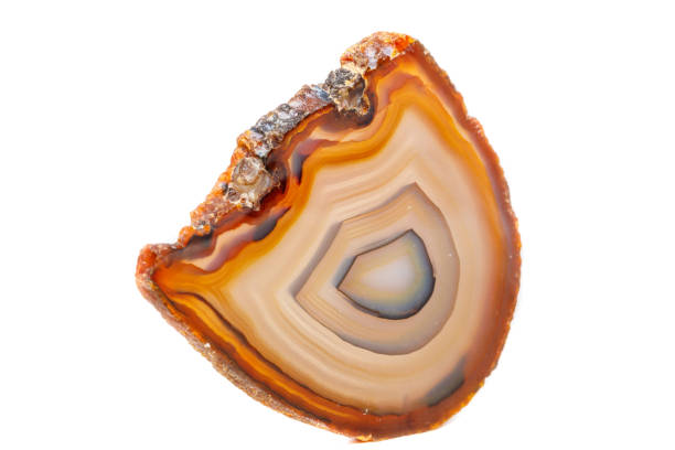 istock Macro mineral stone Yellow, brown Agate breed a white background 1055266844