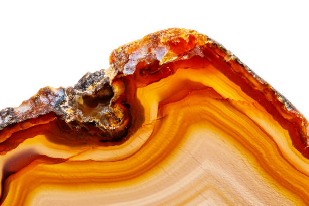 istock Macro mineral stone Yellow, brown Agate breed a white background 1055266890