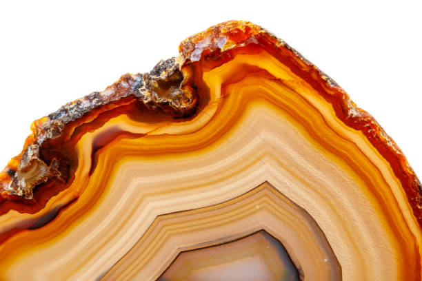 istock Macro mineral stone Yellow, brown Agate breed a white background 1055267290