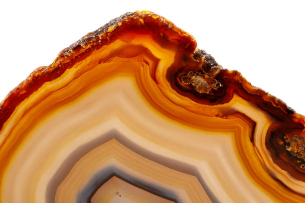 istock Macro mineral stone Yellow, brown Agate breed a white background 1055267346