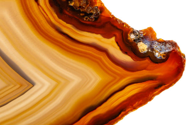 istock Macro mineral stone Yellow, brown Agate breed a white background 1055267396
