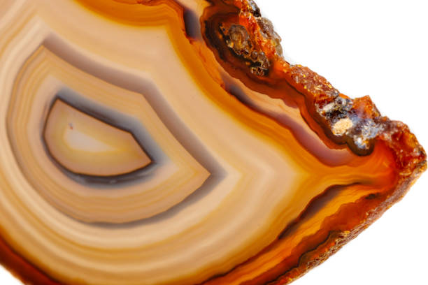 istock Macro mineral stone Yellow, brown Agate breed a white background 1055267512