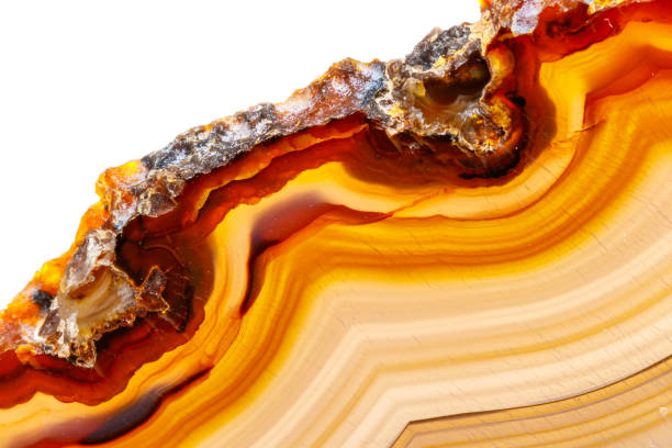 istock Macro mineral stone Yellow, brown Agate breed a white background 1055267686