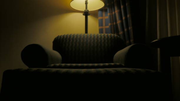 istock chair and lamp in corner 1055267718
