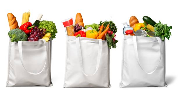 Groceries. Shopping bags with groceries isolated on white bag stock pictures, royalty-free photos & images