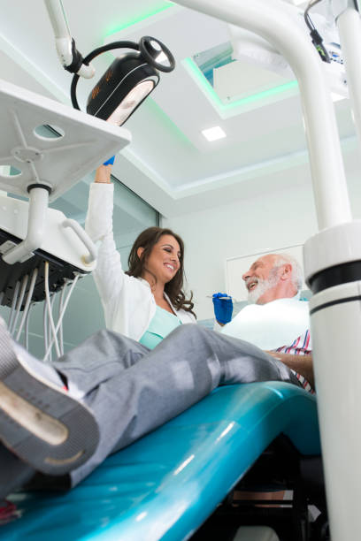 istock Senior man at the dentist 1055273114