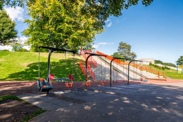 A series of swing for kids, toddlers and disabled children in Duthie Park, Aberdeen, Scotland stock photo