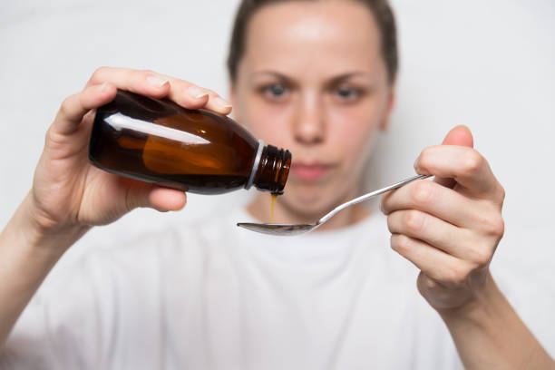 istock The nurse pours the medicine 1055277196