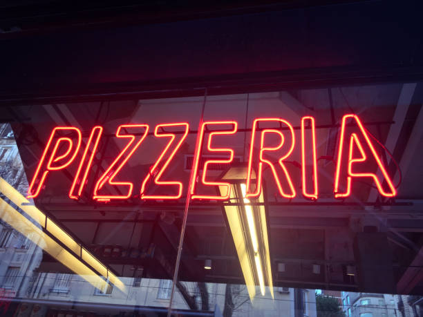 Cyan neon light shaped into the word \