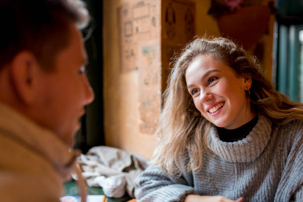 istock Young couple in a bar 1055278212