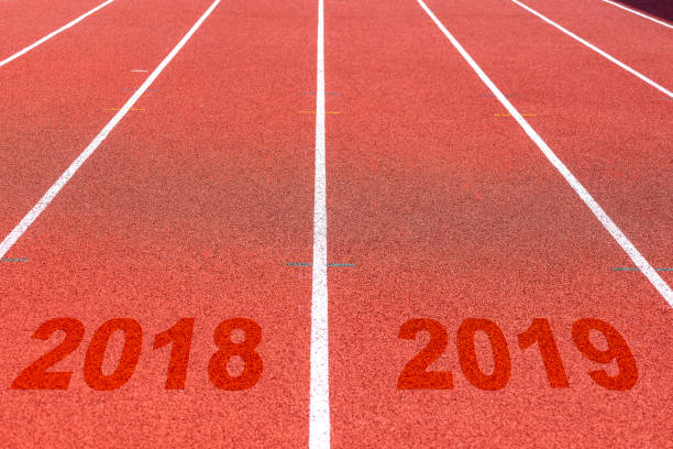 istock Close up of Running track pattern background in stadium. 1055291084