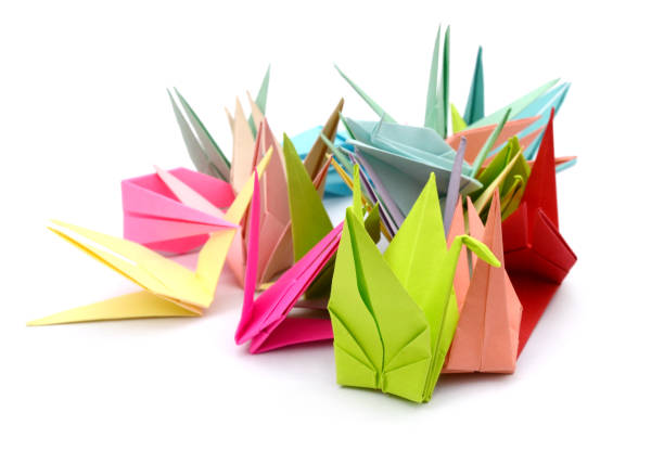 istock Origami paper and figures 1055291218