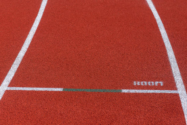 istock Close up of Running track pattern background in stadium. 1055292774