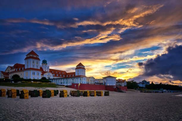 sunset and beach chairs on island rügen, northern germany, on the coast of baltic sea - binz imagens e fotografias de stock