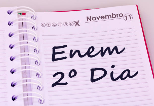 istock Education and concept. Schedule with markings in Portuguese. (translation: November 11, ENEM - National exam of high school in Brazil, second day) 1055304278