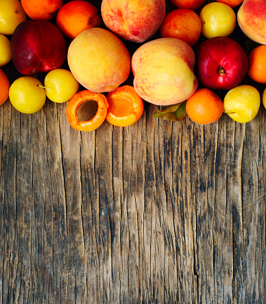 Fresh summer fruits in wicker tray