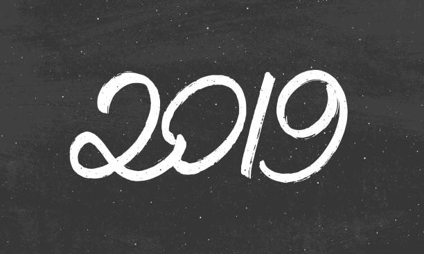 istock Happy New Year 2019 greeting card design with typography text on black chalkboard background. Vintage vector illustration with hand drawn lettering for Chinese Year of the Pig. 1055312356