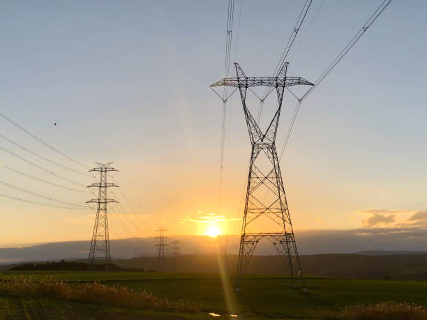 istock Electric power lines at sunset 1055314060