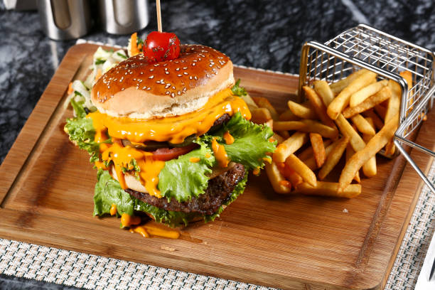 istock Tasty burgers on table 1055319518