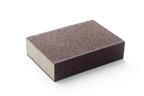 emery sponge Emery sponge isolated on white background porous sponge stock pictures, royalty-free photos & images