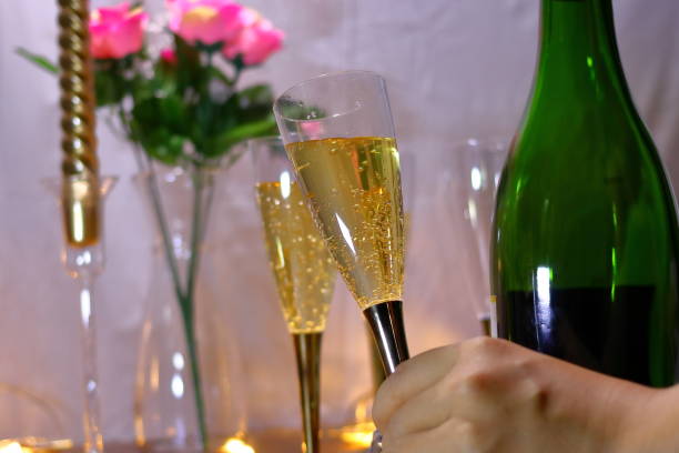 istock Champagne, bottle and roses 1055344974
