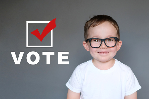 Cute Kid encouraging others to register and vote