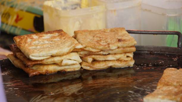 istock Murtabak Daging - a local fried pancake beef with mix vegetables 1055345382