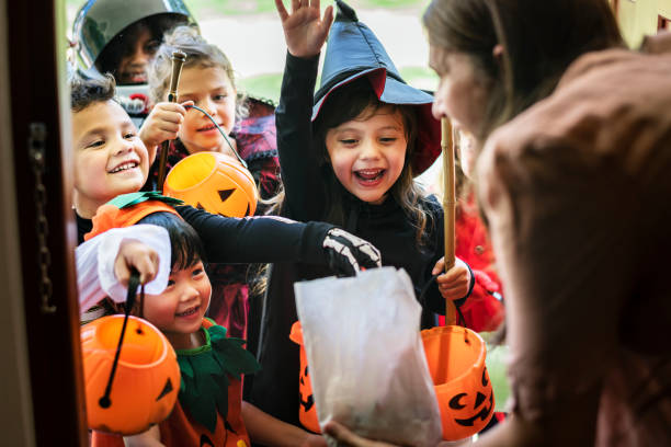 istock Little children trick or treating on Halloween 1055349962