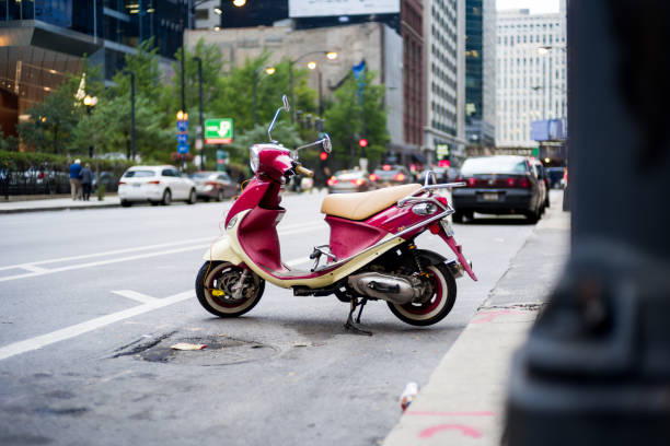 istock Vintage Scooter Parked in a downtown street 1055354786