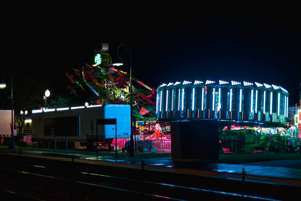 istock Carnival Rides Night Lights and Movement 1055356764