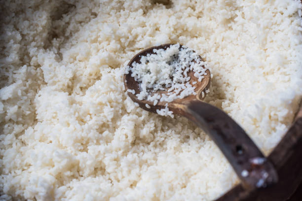 istock White rice in a large wooden container 1055360002