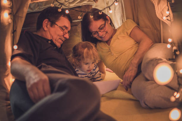 istock Playful night with grandparents 1055364660