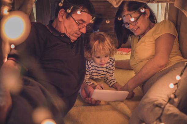 istock Playful night with grandparents 1055364688