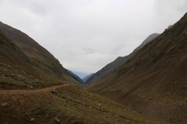 istock The Beautiful Tracks on big mountains in kashmir under dark cloudy sky 1055371322