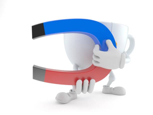istock Tea cup character holding horseshoe magnet 1055380394