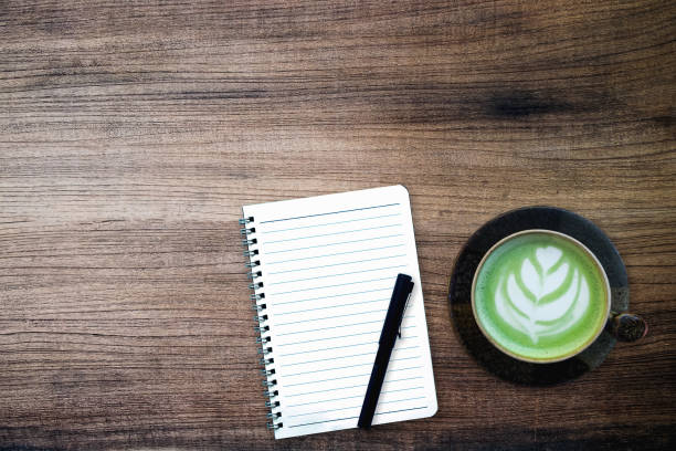 istock green tea latte on wood background 1055381686