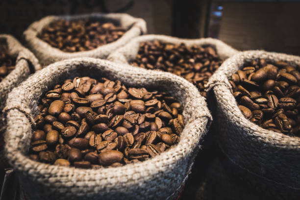 istock Coffee beans in bags. 1055389594