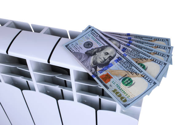 istock Radiator battery with dollars 1055394014