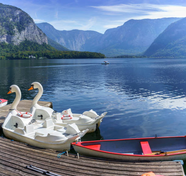 istock Paddle boats for rent on Lake Hallstatt , Austria 1055394106
