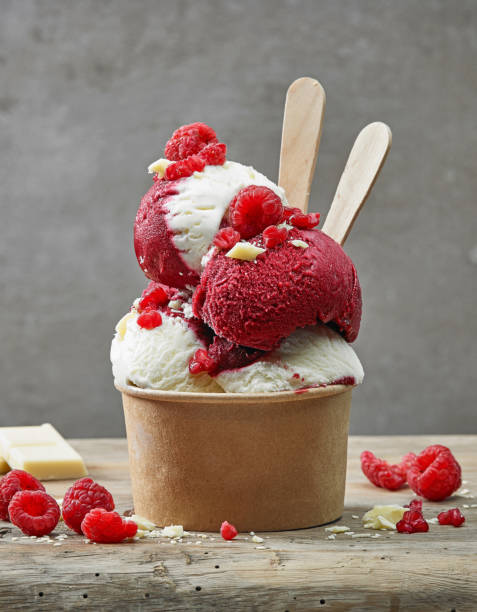 istock paper cup of white chocolate and raspberry ice cream 1055397784