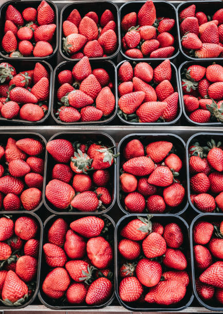 istock Strawberries in basket at market 1055400906