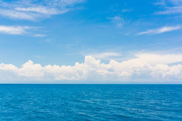 istock Blue sky with cloud in sea background 1055434560