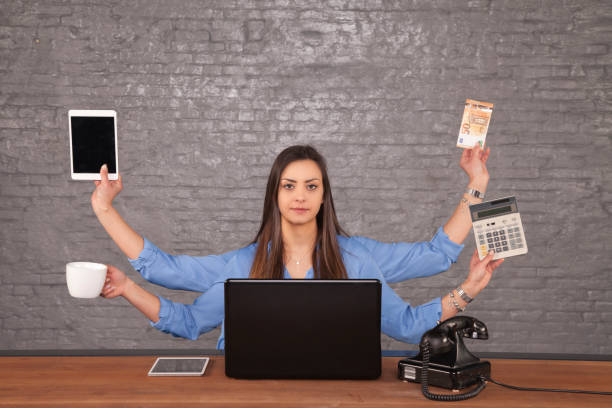 istock perfect businesswoman, doing several things at once 1055435382