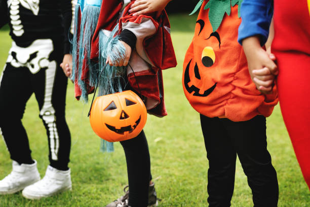 istock Little children trick or treating on Halloween 1055437392